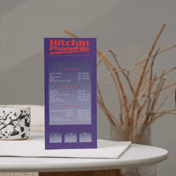 Hitchin PhoneFile directory standing on a table at home, showing how a printed local directory stays visible in a household